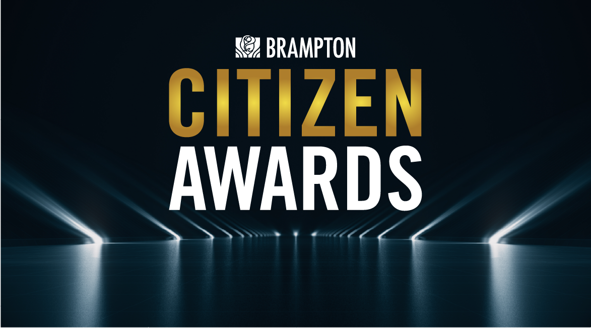Black stage with spotlights pointing at text reading, "Brampton Citizen Awards"