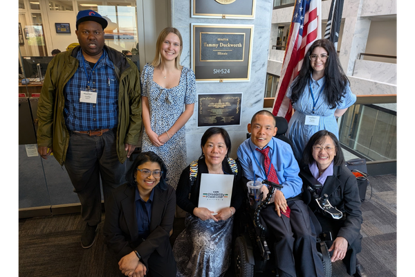 a group of people inside the office of US Senator Tammy Duckworth 