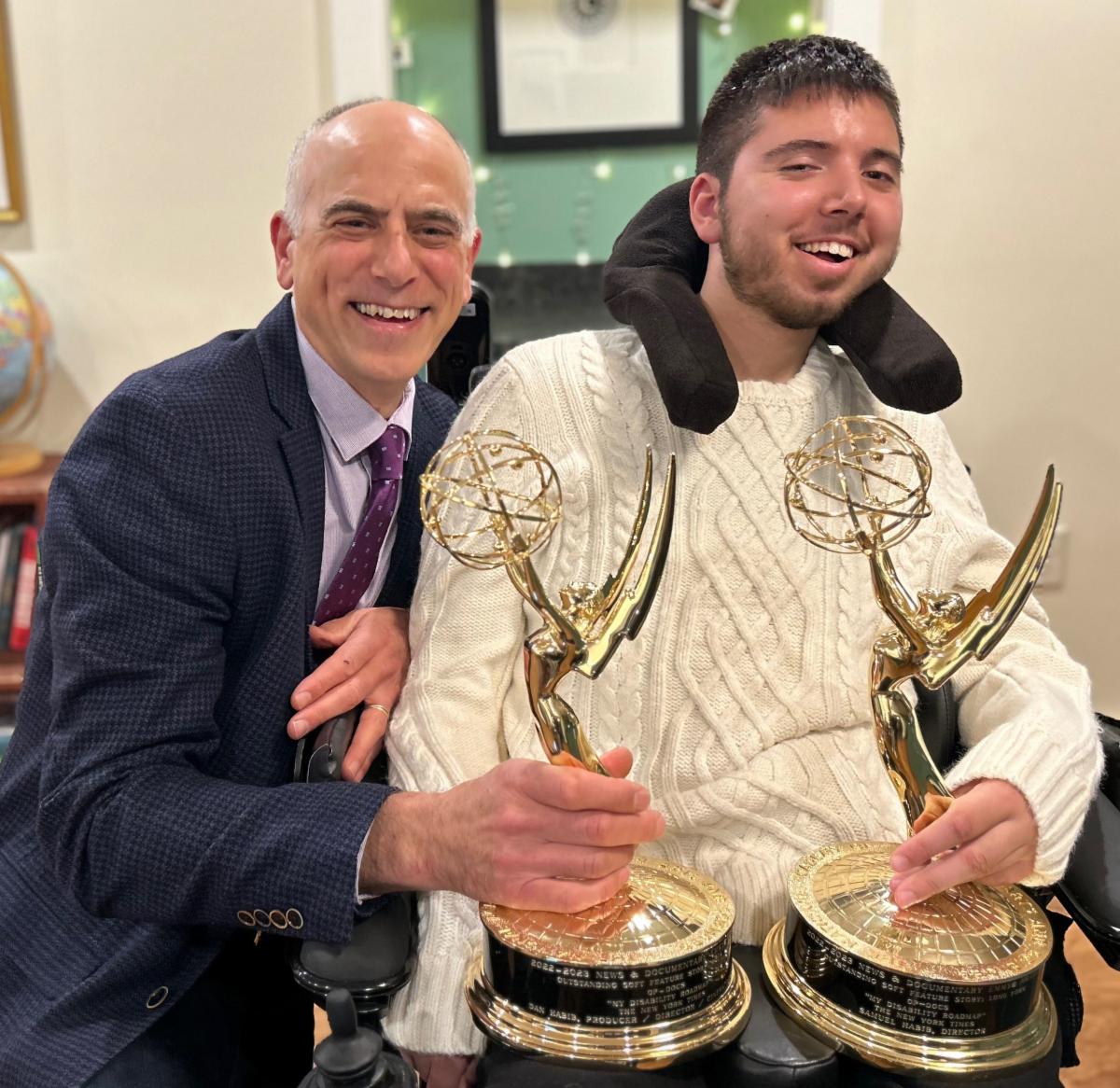 Dan and Samuel hold their Emmy Awards