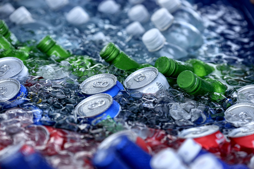 beer and soda bottles in the ice