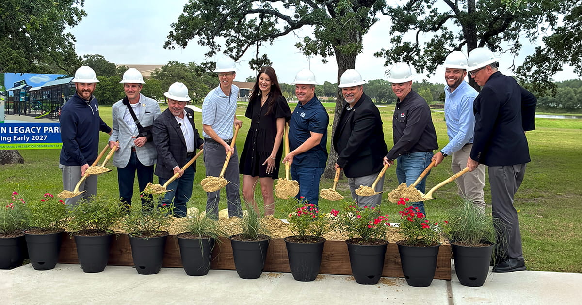 City Council, donors, Lone Star Recreation representatives and the City Manager hold dirt in shovels while posing for a photo during the ceremonial groundbreaking.