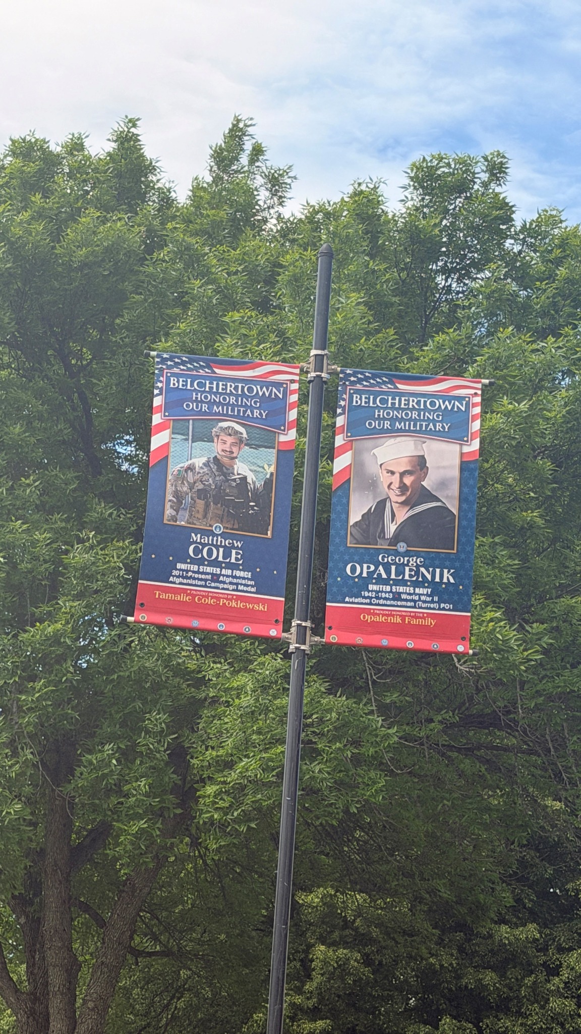 Two military honor banners on the Town Common