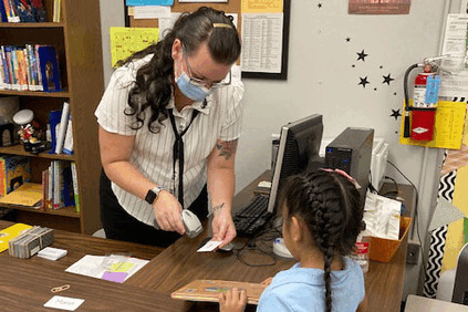 Photos of students first visits as libraries reopen in TUSD