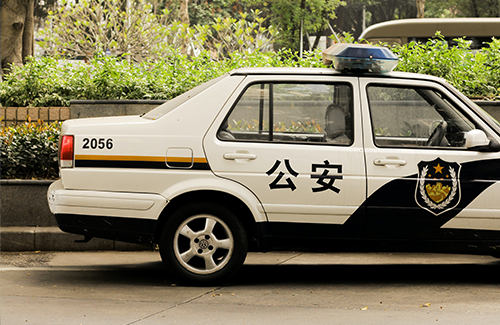 Police car in Shenzhen China. Photo by Enxyclo Studio on Unsplash