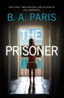Book cover for The Prisoner by B. A. Paris. A woman stands in a dark room, looking out the window.