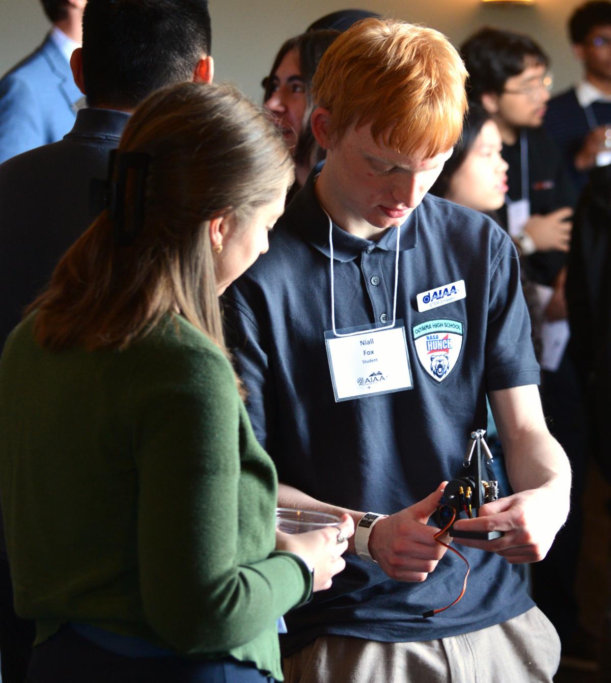 Olympia High School students presenting their NASA HUNCH projects
