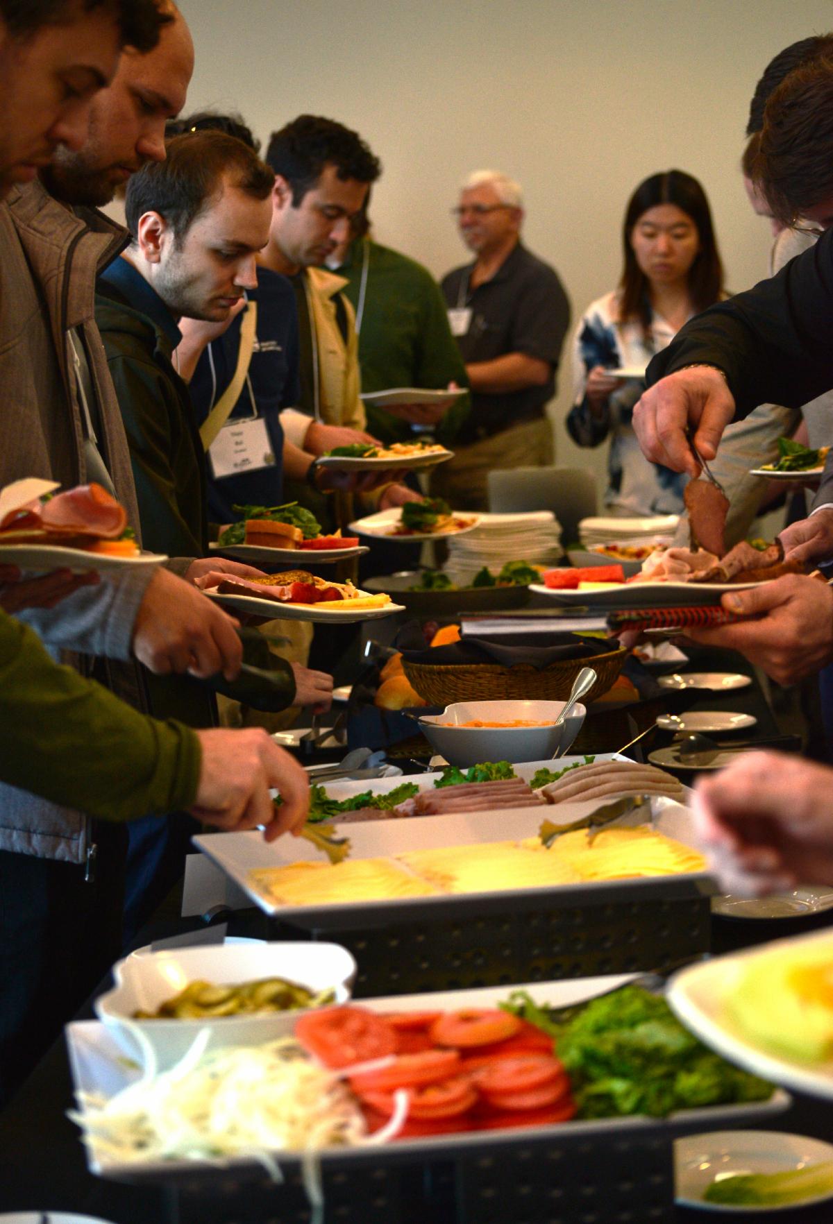Evening networking reception with appetizers and beverages