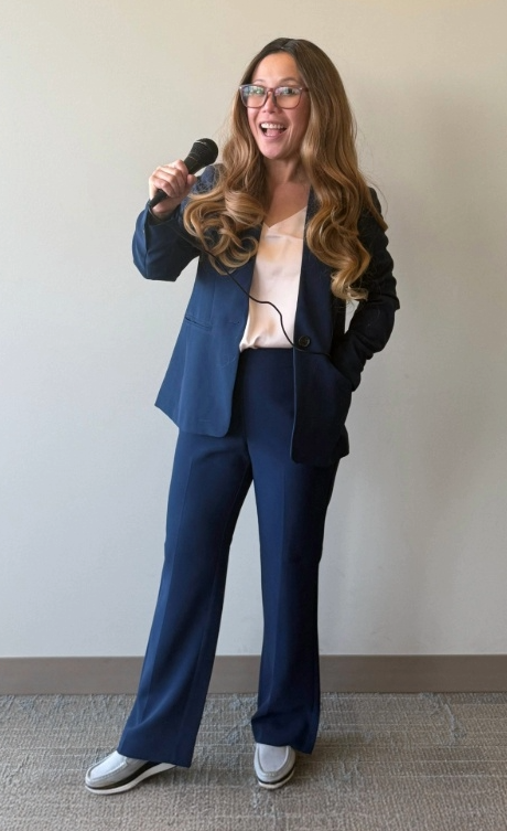 Dermatology staff in Game Show Host Halloween costume.