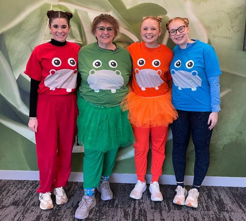 Dermatology staff in Hungry Hungry Hippos Halloween costumes.