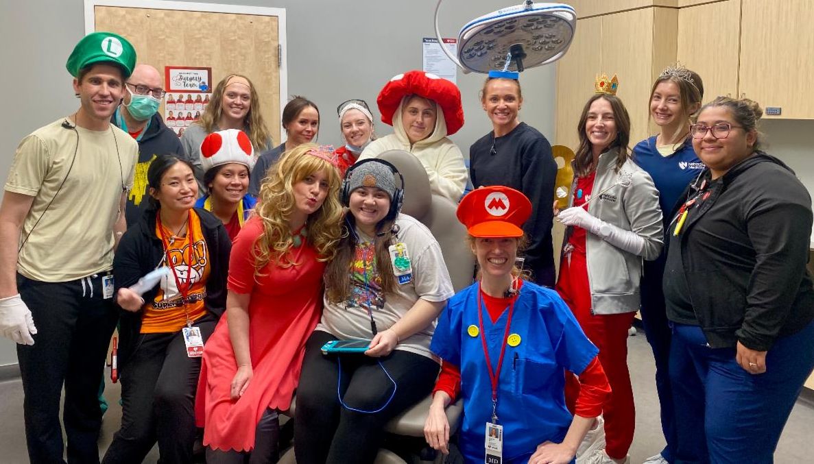 Dermatology staff in Mario Halloween costumes.