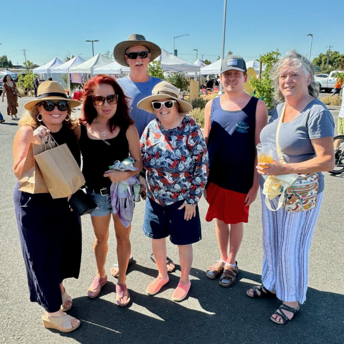 Supervisor Burgis and five community members stand and pose together