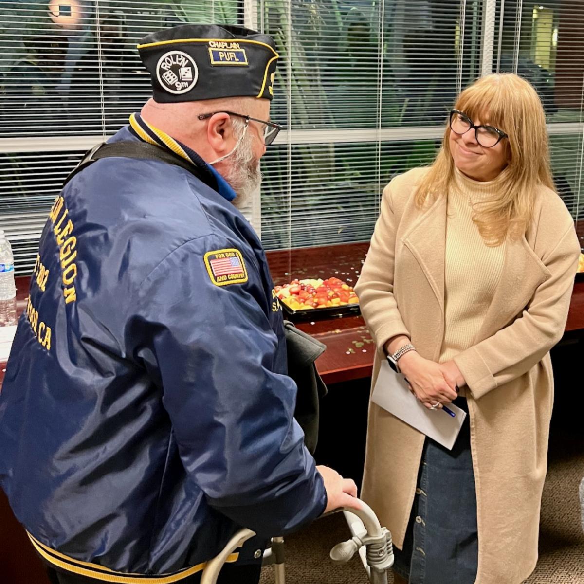 Supervisor Burgis talking with a veteran