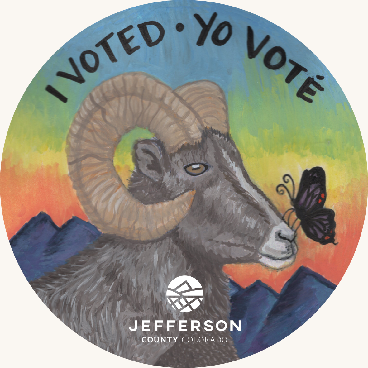 Circular illustration of a bighorn sheep with a butterfly on its nose against colorful mountains. Text reads â€œI VOTED Â· YO VOTÃ‰â€ and â€œJefferson County Colorado.â€
