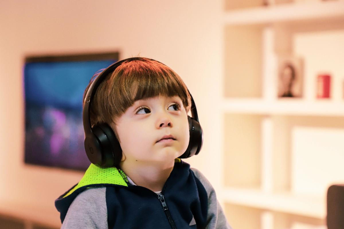 Young boy wearing headphones