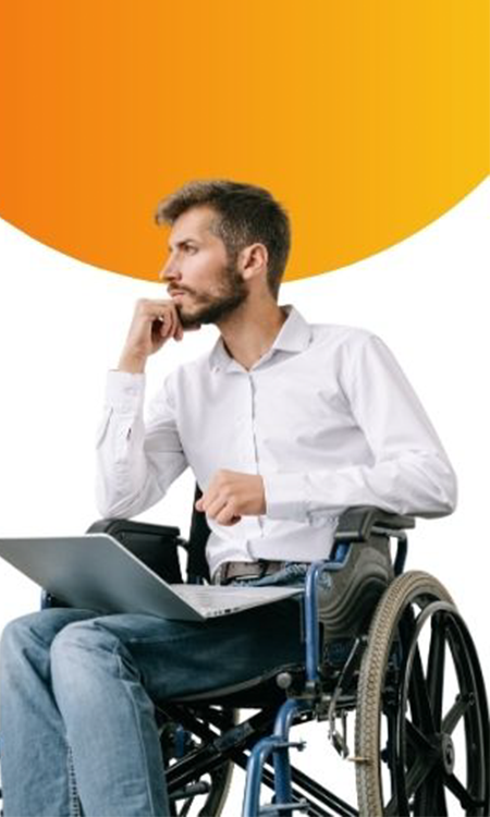 Man using a wheelchair rests his chin on his hand with a laptop on his lap