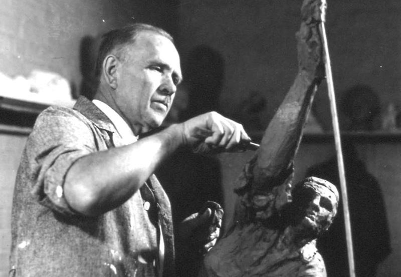 black and white photo of Christian Petersen sculpting