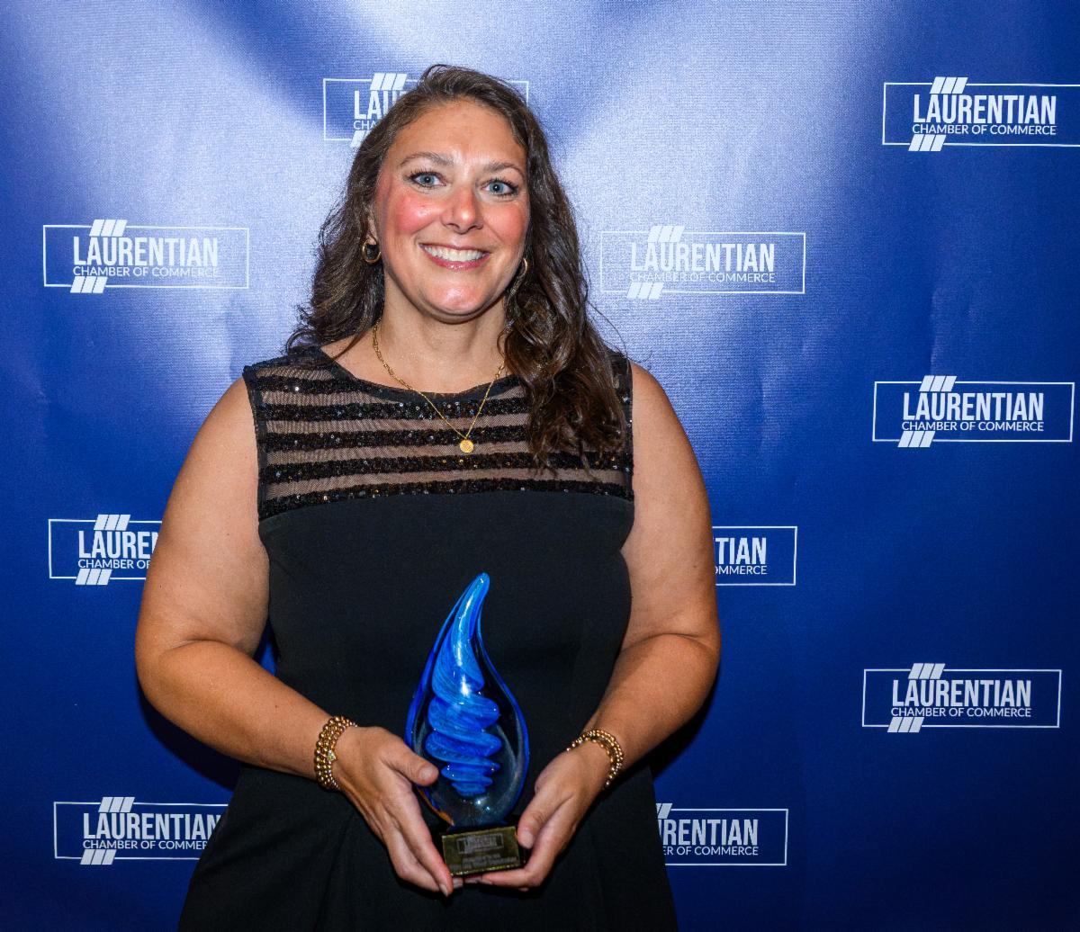 Christy Lang of Midwest Communications accepts Ambassador of the Year