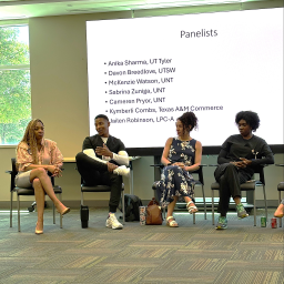 Four panelists at a presentation in Childrens Health Plano