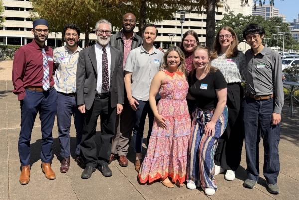 A large group of individuals stands together at the Texas Psychiatry Chief Residents