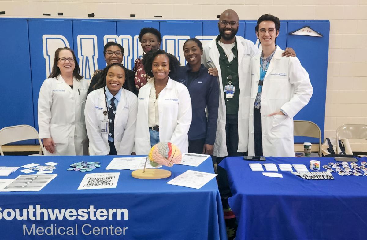 A group of doctors particplating in the Black Men in White Coats Youth Summit in February 2026