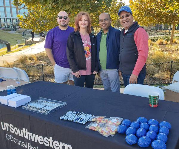 Members of the UT Southwestern Psychiatry Department  provide an information table at Shatterproof Walk 2025.