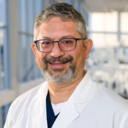 Head and shoulder of Dr Collin Vas