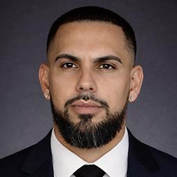 Head and shoulders photo of Miguel Garza