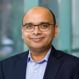 Head and shoulders photo of Dr Manish Jha
