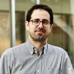 Head and shoulders photo of Dr. Aref Pariz