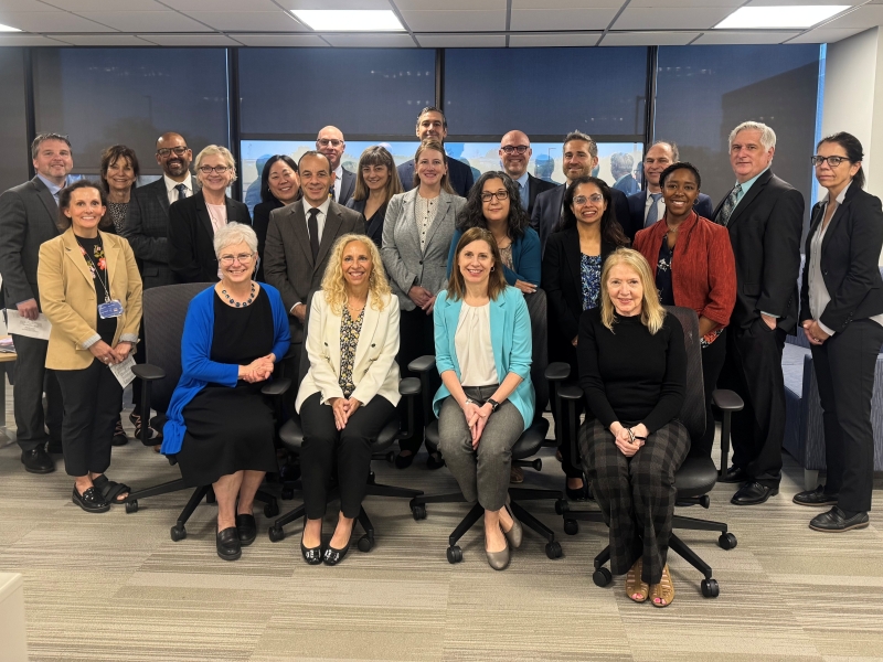 large group of people in office setting