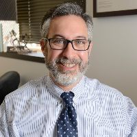 Head and shoulders photo of Dr. Adam Brenner
