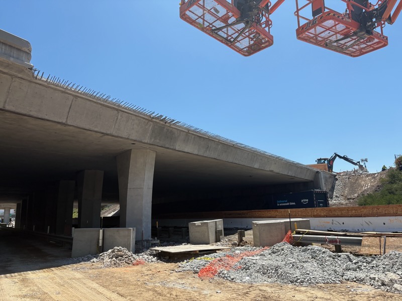 Construction activity ongoing along SB SR-261 at the I-5 bridge