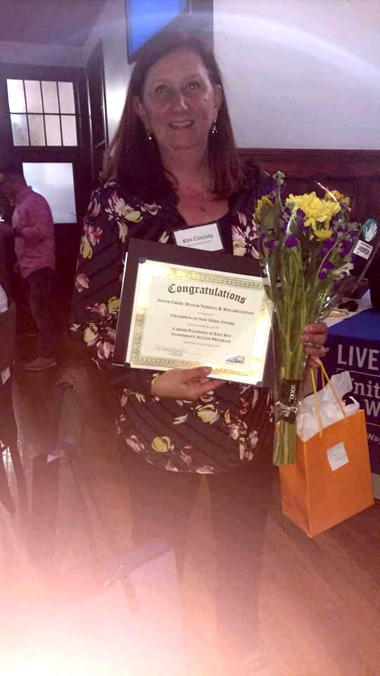 Kimberly Ciociola, Administrator of Silver Creek Manor Nursing and Rehabilitation Center, with her Champion of New Hires citation.