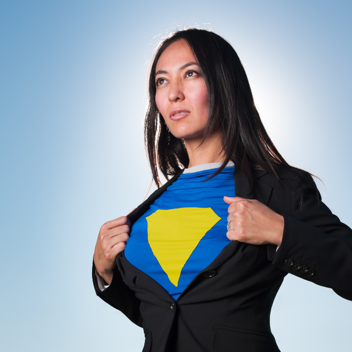 Women in suit with superhero costume under jacket 