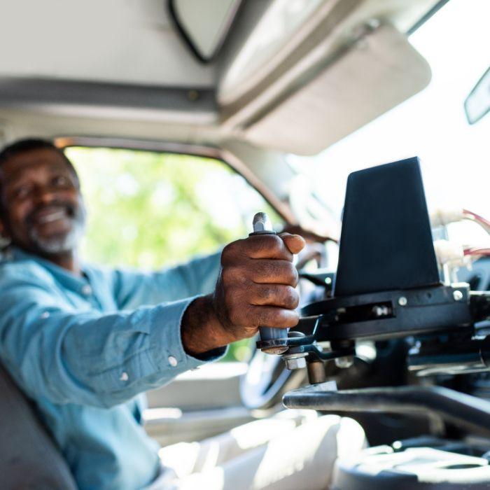 Photo of bus driver opening bus door