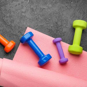Yoga mat and hand held weights in four different sizes 