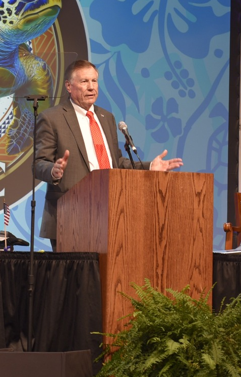 Commissioner Causey presenting guardian award to Jerry Ward