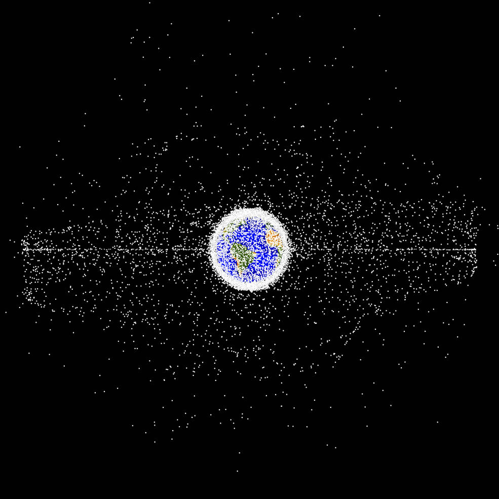 Digital image of Earth in space. Lots of white dots, representing space waste, surround the planet. The dots get denser closer to Earth.