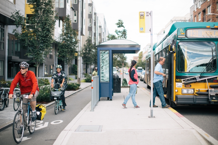 Image of a floating bus stop adjacent to protected bicycle lanes