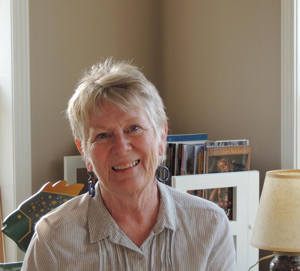 headshot of Linda Blaskey facing the camera and smiling sitting in an office