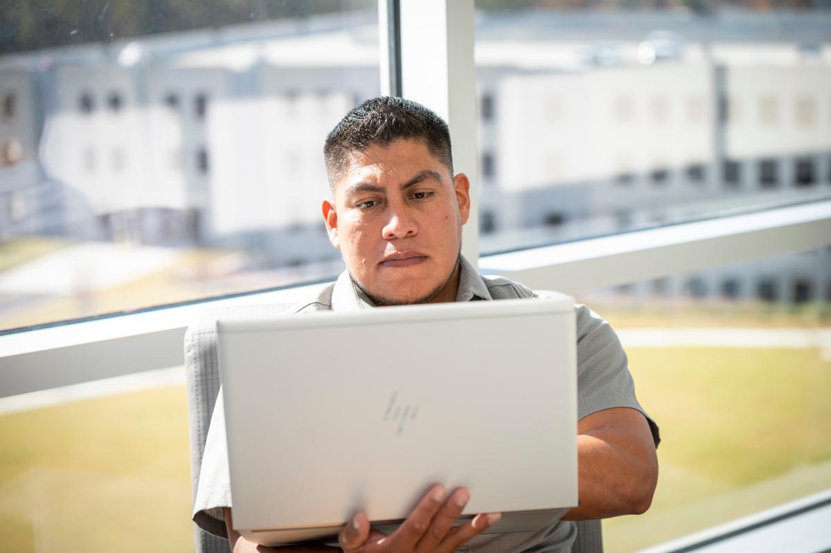 man using laptop