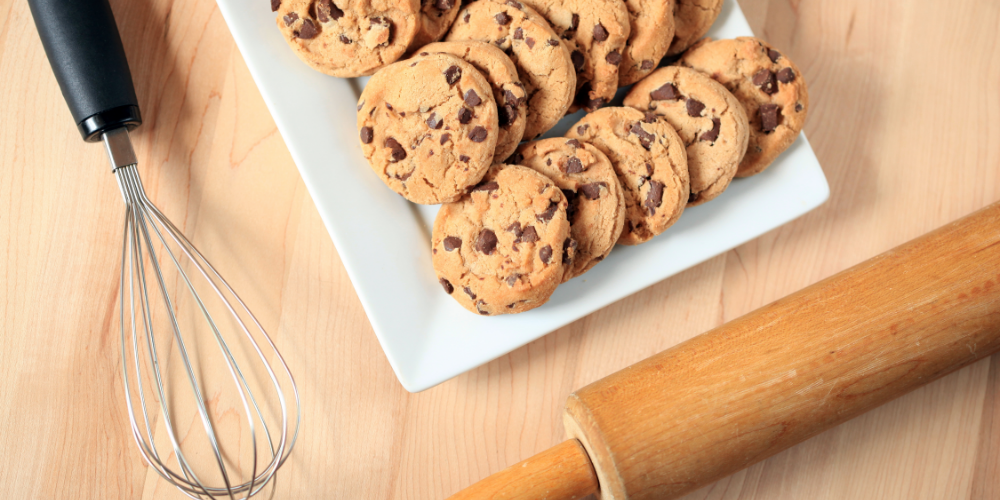 cookies whisk and a rolling pin