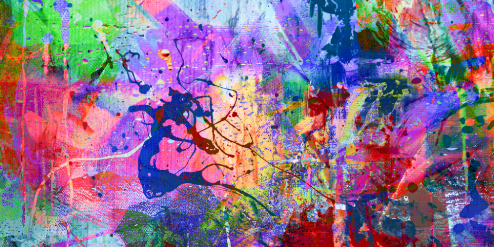 paint splattered on a canvas in various colors