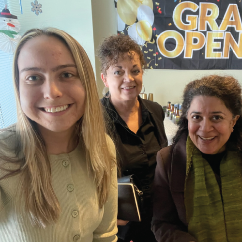 Fearless! staff talking a selfie at the Grand Opening.