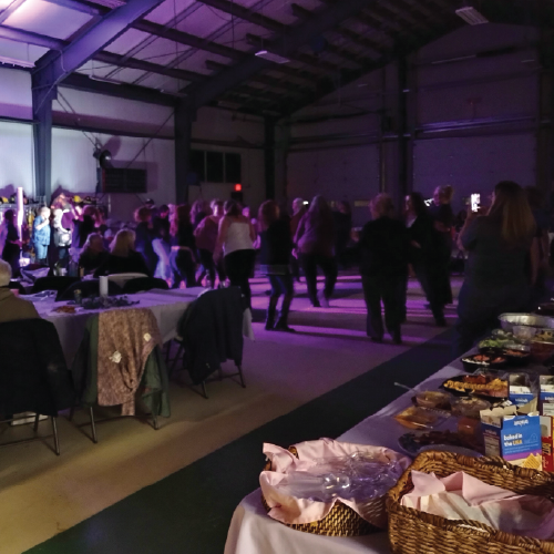 Group of people dancing at the event