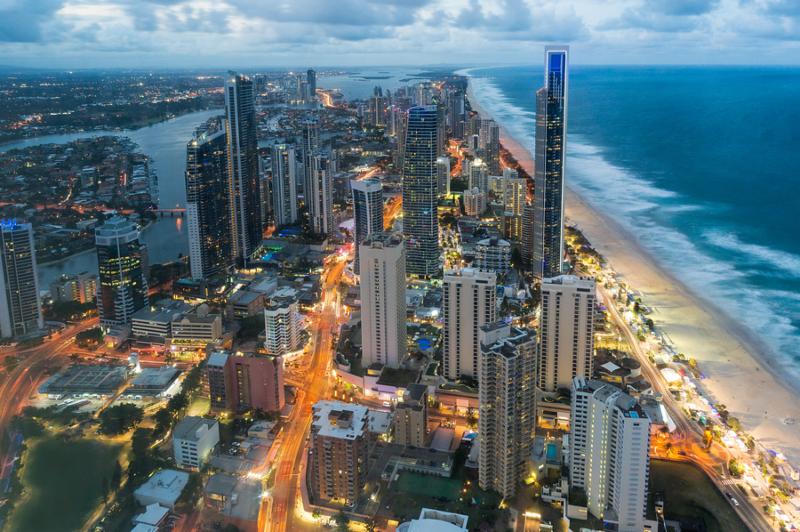 Aerial view of modern city at night. Surfers Paradise, Gold Coast, Australia. Beautiful modern skyscrapers at night