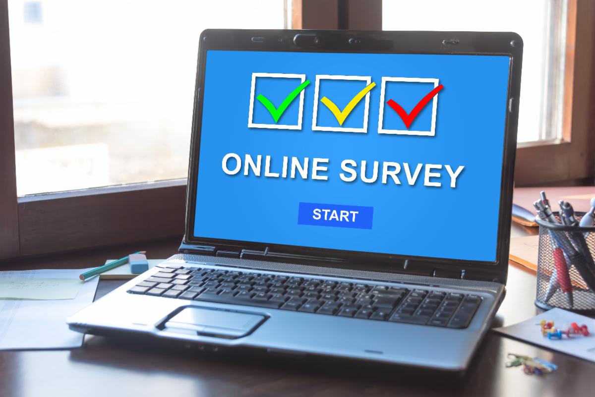 Image of a laptop screen with the word "survey" and checkboxes