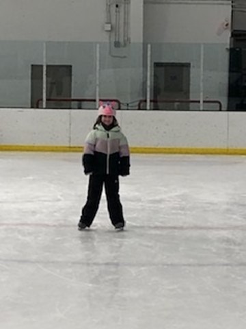 A Sib skates at the ice rink at Leddy Park