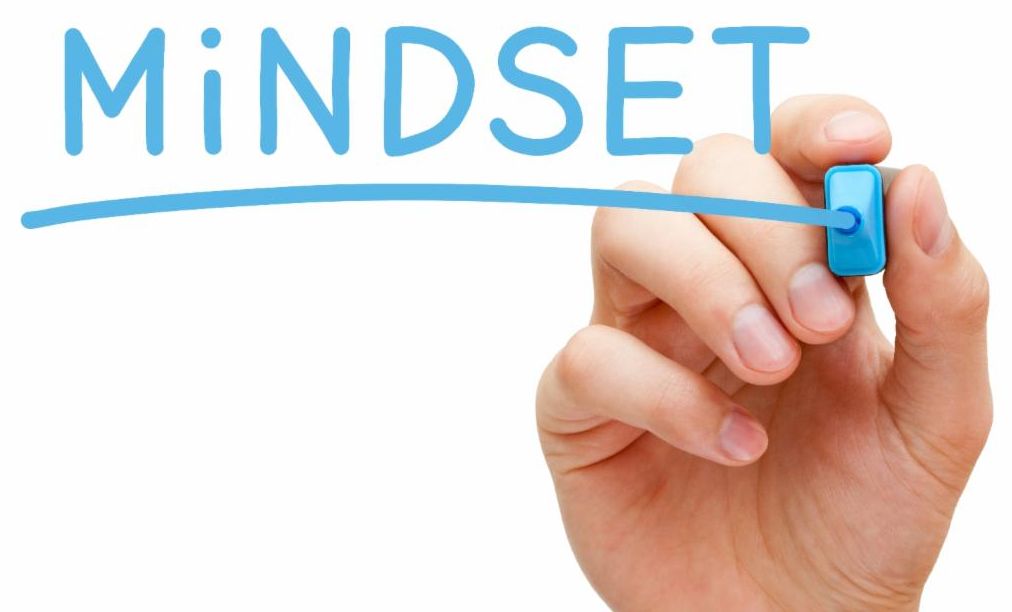 A hand holding a light blue marker?  Mindset!