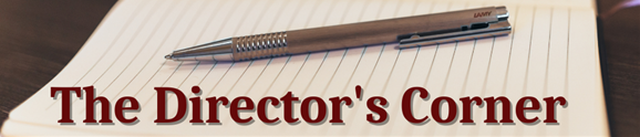 A sheet of lined paper with a pen on top.  The Director's Corner!